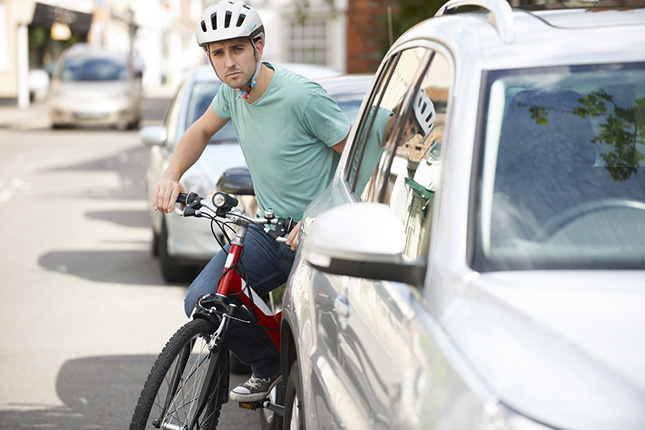 Beschadigde carrosserie door fiets